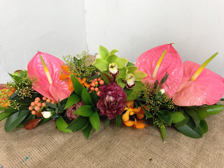 Pink Anthurium, Green Cymbidium & Mokara Orchid Table Arrangement